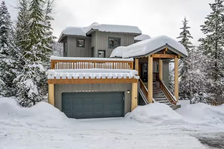 Chalet exterior buried in fresh snow